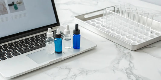 Researching where to buy GHK-Cu peptide online with bottles and lab equipment on a desk.