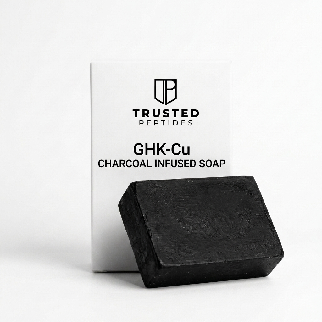 Trusted Peptides GHK-Cu Charcoal Infused Soap - black charcoal bar and white box